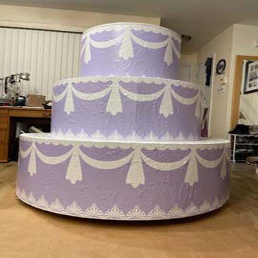 Popout Jumpout Giant Cakes signature logo cake in Alabama